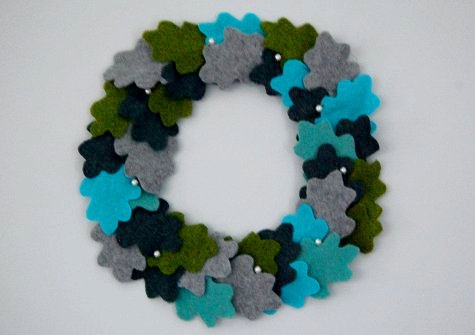 Make a cute wreath from old sweaters.