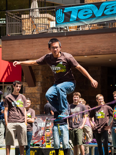 Young Man Balancing on a slackline in Vail, Colorado